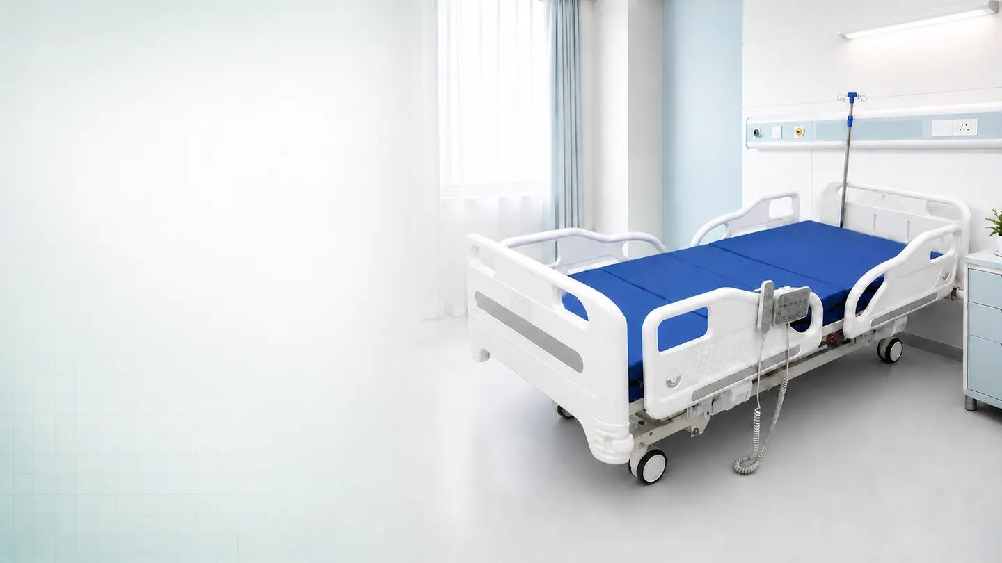 Electric hospital bed in a hospital room